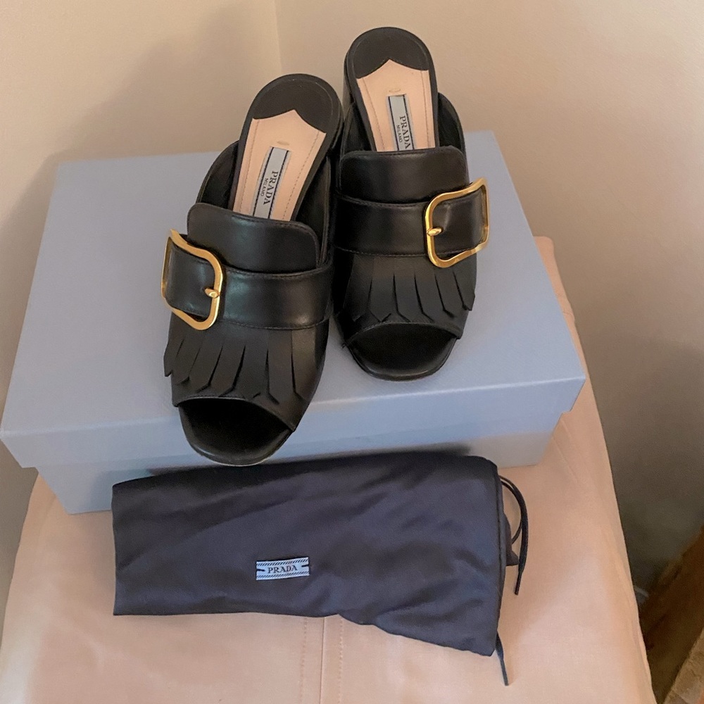 Prada Black Leather Block Heel Mules with Brass Buckle and Fringe